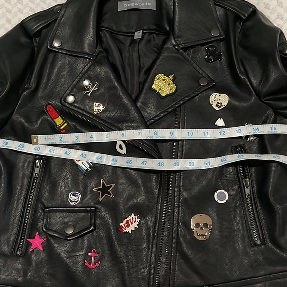Faux leather jacket with patches and charms - Picture 4 of 5